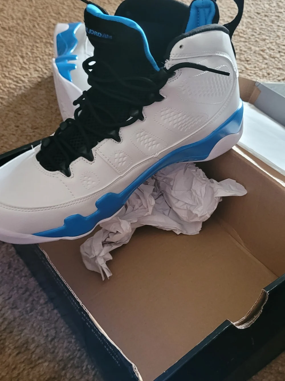 Jordan 9s White, Black and Carolina Blue High-Top Basketball Sneakers